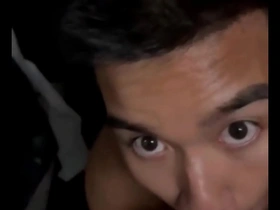 A young Asian man gives a blowjob to a well-endowed man at the ClubRio in Florida.