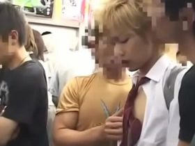 Gay Japanese boy gets a handjob on a train