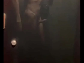 An Asian man masturbates in the shower in Hanoi, Vietnam.