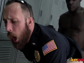 Gay police officers are seduced by a hot man who is released from prison.
