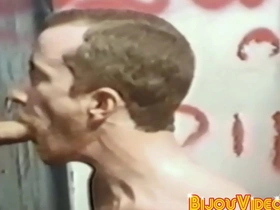 Classic glory hole scene with muscular men giving blow jobs and facial finish