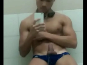 Hot Asian guy swims and masturbates in the pool