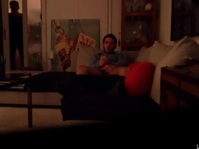 Young man caught masturbating by older man who watches him.