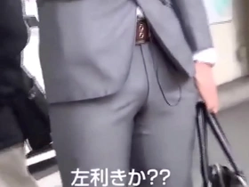 Gay Asian man in suit in amateur video