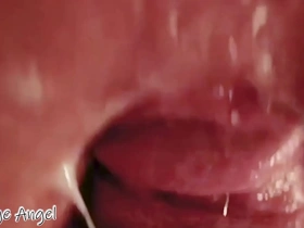 Close up of a twinks bareback cock filled with hot sperm after gay sex
