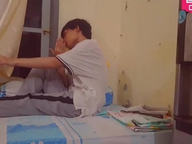 I am a young Asian girl and I perform a hot solo scene in the rain.