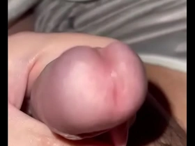 Asian man masturbates with a small penis.