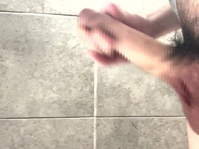 Young Japanese man masturbates with his big dick